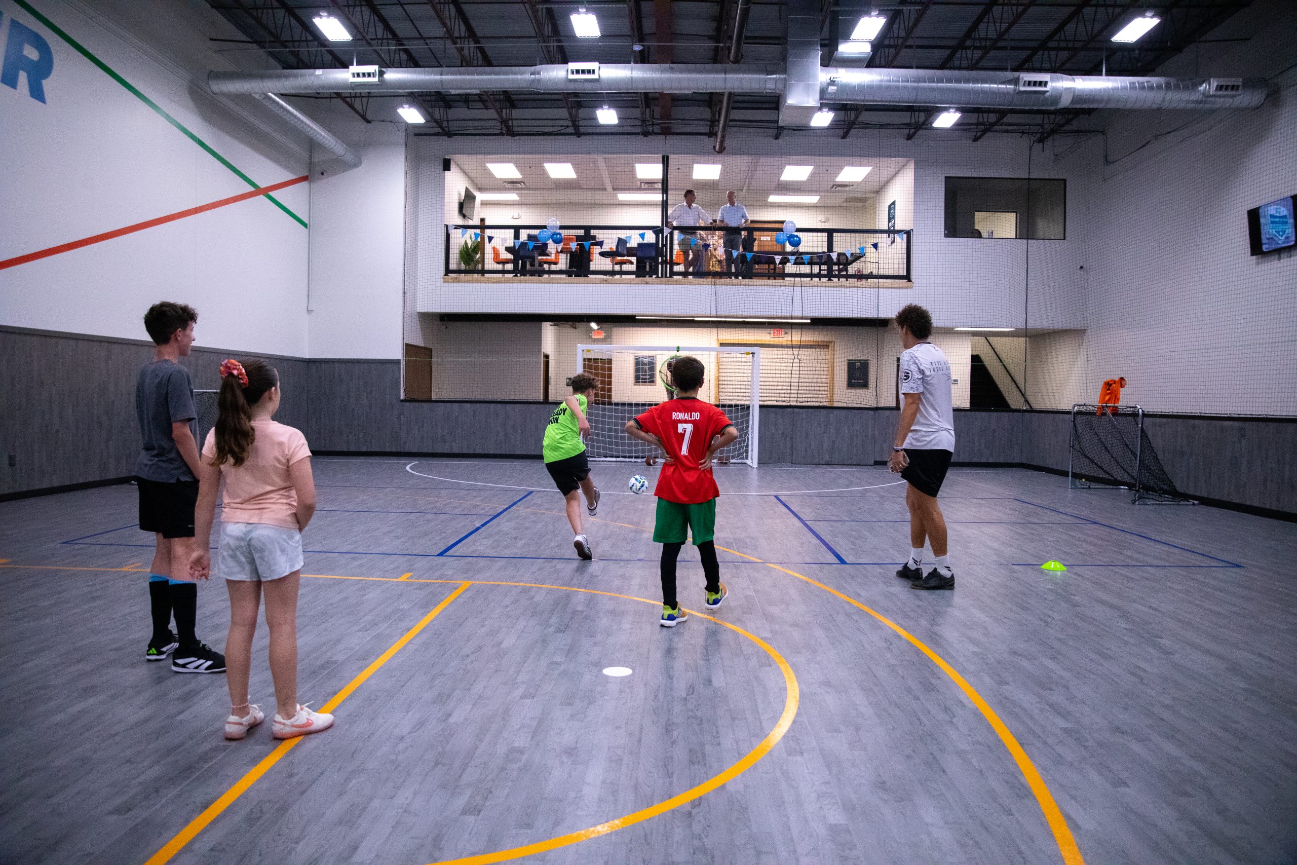 Youth soccer players in action at Frontrunner Fieldhouse
